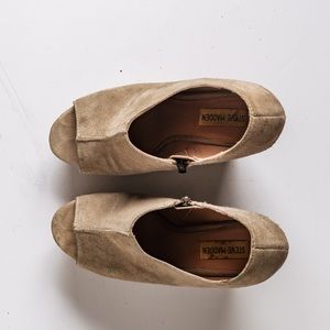 Wedge open toe shoes.